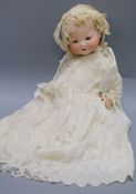 An Armand Marseille bisque headed baby doll, open mouthed, sleeping eyes and jointed body