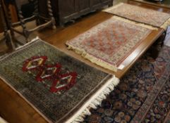 Two silk mats and one other 84 x 60cm, 94 x 60cm and 96 x 60cm