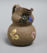 A Chinese earthenware jug height 9cm