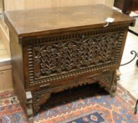 A small Continental walnut drop-front carved coffer W.64cm