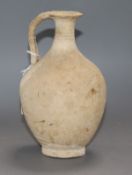 A Roman pottery ewer height 18cm