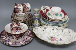 An oval Meissen porcelain dish, a Worcester part tea service, a pair of Faience candlesticks, etc.