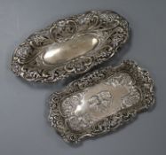 Two late 19th/early 20th century embossed silver trinket dishes, one decorated with Reynold's