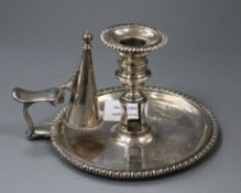 A George III silver chamberstick and extinguisher, by William Stroud, London, 1815, 14.5 oz, 14.