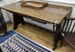 An Arts and Crafts oak refectory table W.152.5cm