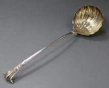 A George III silver soup ladle with shell bowl, indistinct marks, 6 oz.