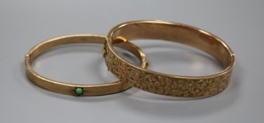 Two 9ct. gold hinged bangles.