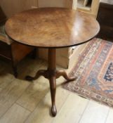 A George III mahogany tilt top circular tea table W.66cm