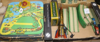 Three tinplate toys, c.1950, to include a Mar Futurmatic Airport, and a vintage Rowntree tin (4)