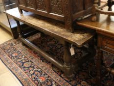 A small 17th century and later oak refectory table W.188cm