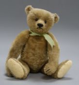 A Steiff teddy bear, Richard, c.1908, with golden mohair, black shoe button eyes, pronounced clipped