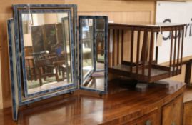 An Art Deco triple toilet mirror and a table top revolving bookcase W.77cm and 35cm