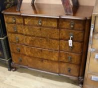 A 1950's Queen Anne style walnut chest of drawers W.98cm