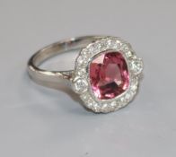 A modern white metal, pink tourmaline and diamond cluster ring, size Q.