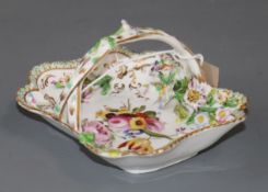 A 19th century Rockingham-style miniature floral basket