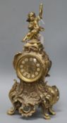 A French ormolu mantel clock, mounted with a cherub height 42cm