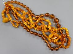 Two amber bead necklaces, (opaque necklace 44 grams).