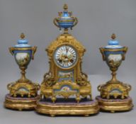A French porcelain and ormolu clock garniture on stand overall height 39cm