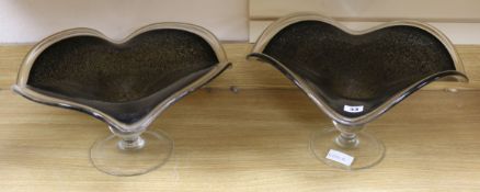 A pair of glass centrepieces length 39cm