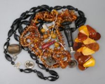 A quantity of assorted amber and jet etc. including seals.