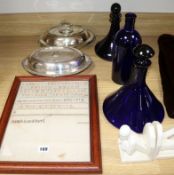 Three pieces of Bristol blue glass, two plated entree dishes, bookends and an unfinished sampler