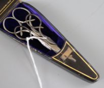A Victorian cased set of two pairs of scissors
