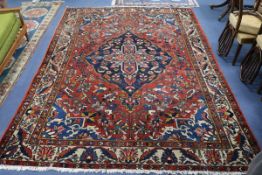 A large red and blue Bakhtiari carpet 360 x 257cm