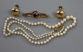 A pair of early 20th century 9ct gold ear screw clips (later mounts), a cultured pearl necklace