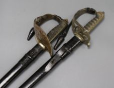 Two officer's dress swords and scabbards