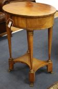 A 19th century French gilt metal mounted cherry wood oval work table W.60cm