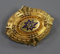 A Victorian yellow metal, enamel and seed pearl brooch, 46mm.