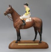 A Beswick horse Arkle and jockey Pat Taaffe, overall height 33cm