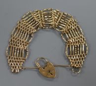 A 9ct gold gatelink bracelet, with padlock clasp.