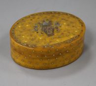 A late 18th century French yellow and white metal pique oval horn snuff box, 74mm.