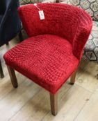 A red velvet tub frame side chair