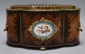 An inlaid French table jardiniere with porcelain plaque length 32cm