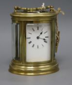 An oval carriage clock