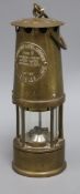An Eccles protector lamp and lighting miner's lamp