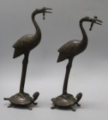 A pair of Chinese bronze cranes standing on tortoises height 26cm