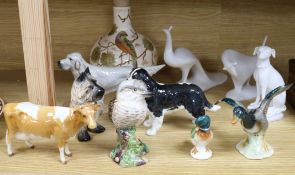 Three Beswick figures including a Jersey cow and seven other ceramic animals including one Parian