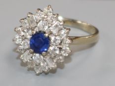 An 18ct white gold, sapphire and diamond cluster dress ring, set with baguette and round cut