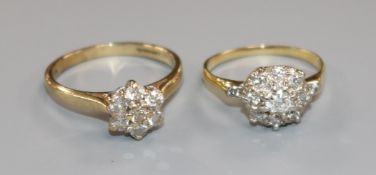 An 18ct gold and diamond flowerhead cluster ring and a 9ct gold and diamond flowerhead cluster