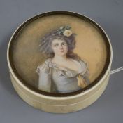 A 19th century ivory snuff box with painted lid