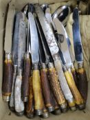 Thirty assorted early 20th century antler handled table knives and dessert knives, with silver