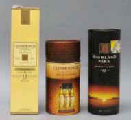 Three bottles of Whisky - Glenmorangie Nectar, Glenmorangie single Highland and Highland Park aged