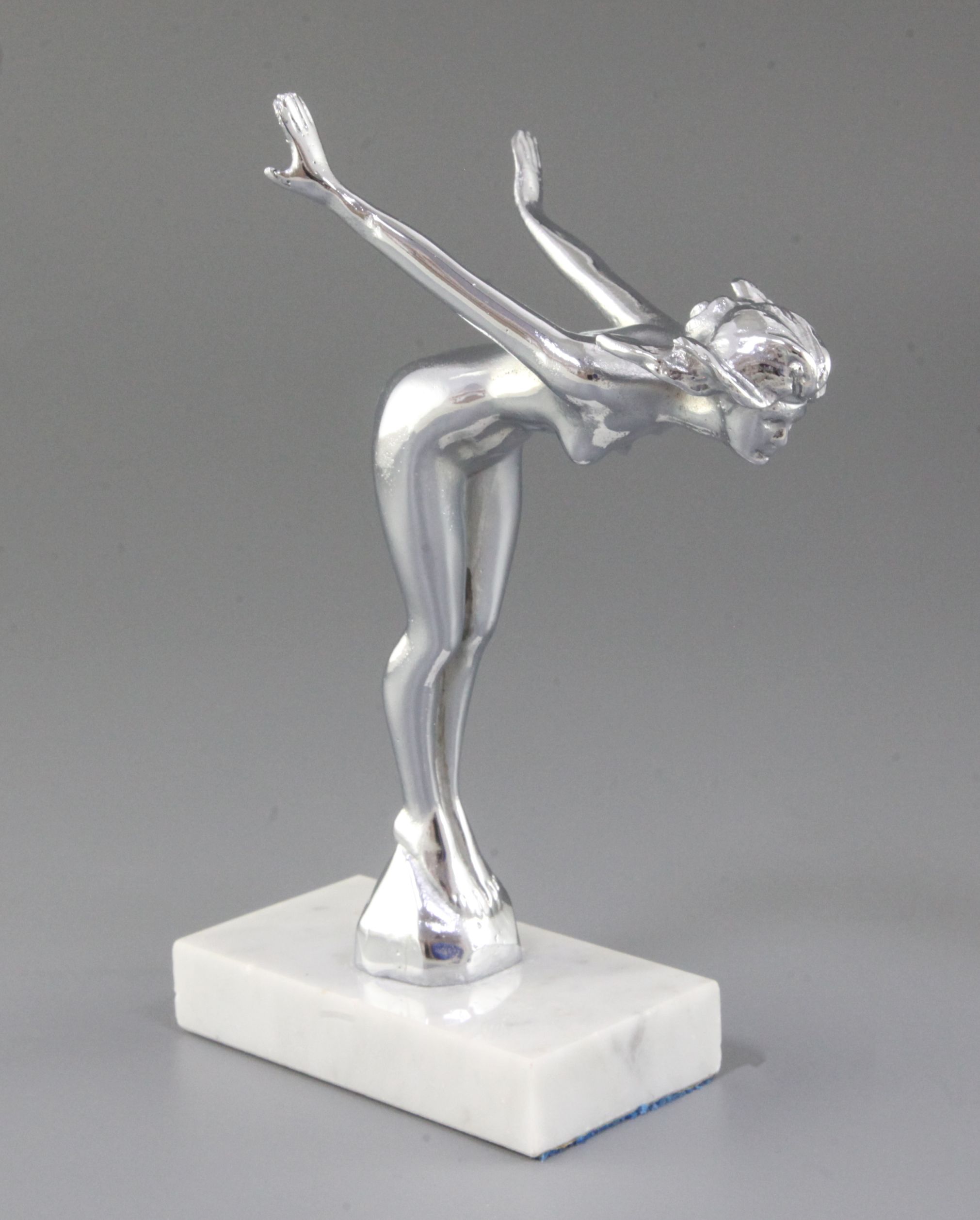 A Desmo 'Diving Girl' car mascot height 20cm