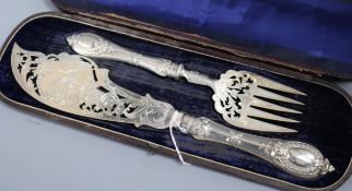 A cased pair of Victorian silver fish servers, Joseph Rodgers, Sheffield, 1860.