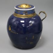 A Chinese Kangxi period gilt-decorated powder blue vase and cover with gilt metal mounts and lock