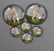 A six piece Essex crystal cricket related unmounted dress stud set, each decorated with a batsman.