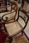 A Regency rosewood dining chair, with two scrolls and gadrooned brass inlaid horizontal rails to the